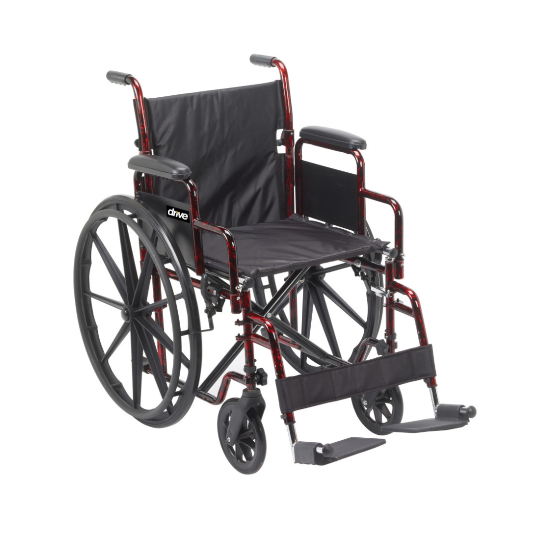 The Drive Rebel Wheelchair with Quick-Release Wheels features a lightweight red folding frame, black seat and backrest, large quick-release rear wheels, small front wheels, armrests, and footrests.